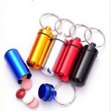 Key chain pill boxes